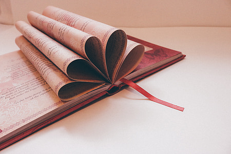 book paper fold on white surface thumbnail