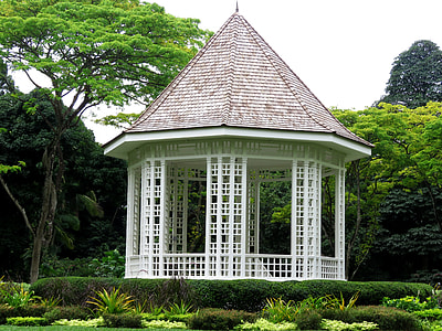 white and red gazebo surrounded by trees thumbnail