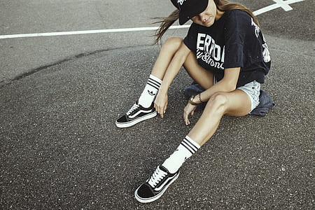 woman sitting on road thumbnail