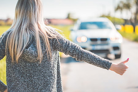 Blonde Woman Hitchhiking Because of Her Broken Car thumbnail