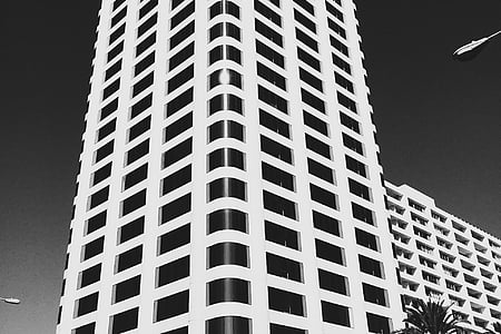 greyscale photography of high-rise building thumbnail