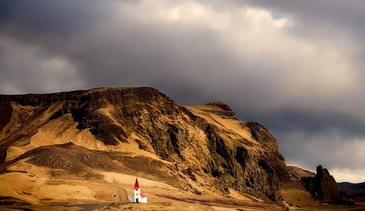 house near a mountain graphic wallpaper thumbnail