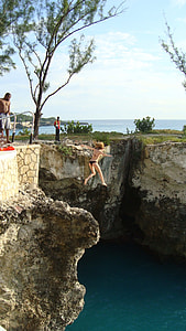woman jumping off a cliff thumbnail