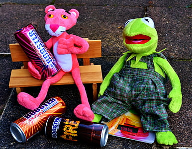 Pink Panther and Kermitt the Frog plush toys on concrete surface thumbnail