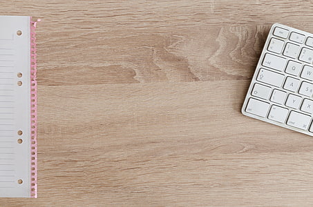 silver Apple Magic Keyboard on table thumbnail