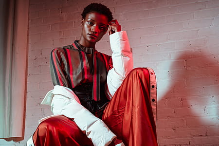 Model Posing In Red Light Photo thumbnail