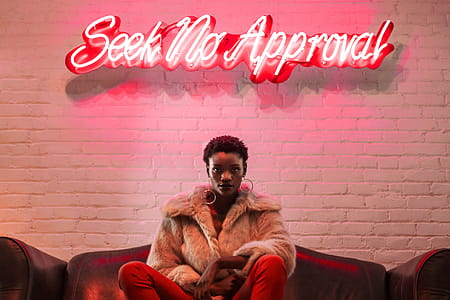 Woman In Fur Under Neon Photo thumbnail