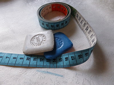 blue tape measure and two chalks thumbnail