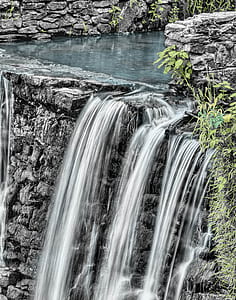 time lapse photography of water falling down on creek during daytime thumbnail
