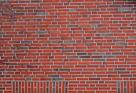 closeup photography of red and gray brick wall thumbnail