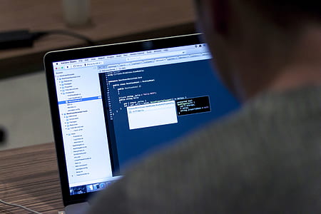 man using laptop computer thumbnail