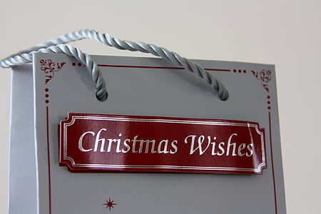 white and red Christmas Wishes printed paper tote bag closeup photo thumbnail