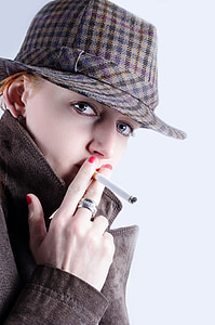 person holding cigarette thumbnail