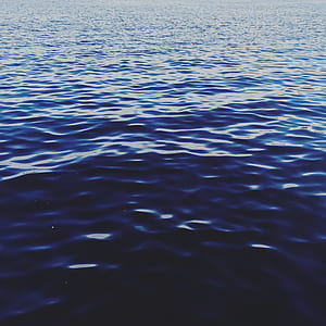 blue body of water during daytime thumbnail