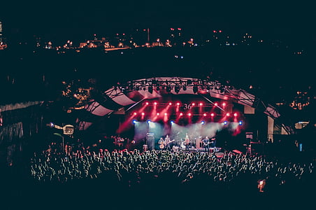 people watching band performing on stage thumbnail