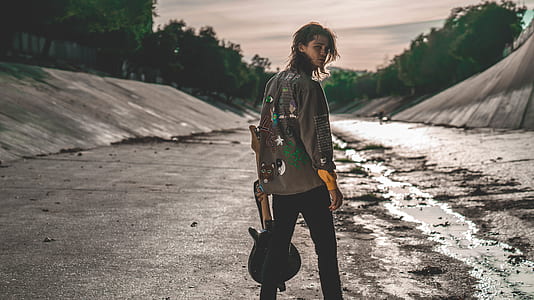 man holding guitar thumbnail