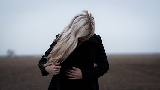 woman with white hair wearing black coat thumbnail