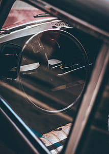 Close-up Photography of Black Vehicle Steering Wheel thumbnail