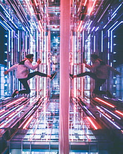 man in jumping gesture reflecting thumbnail