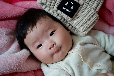 baby wearing white button-up shirt thumbnail