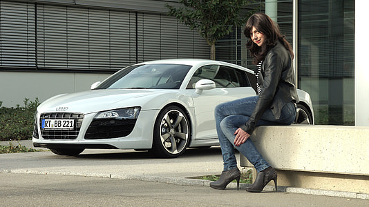 person near white Audi coupe thumbnail