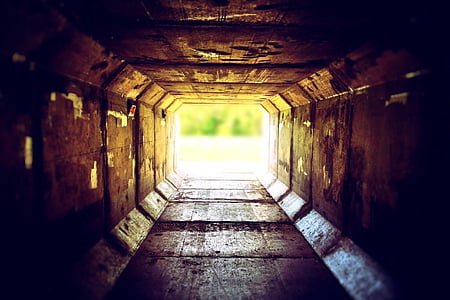 brown tunnel leading outside thumbnail
