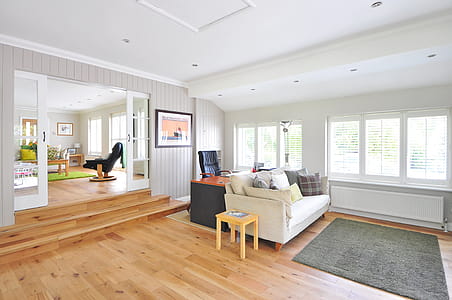 White Couch Near Black Mat thumbnail