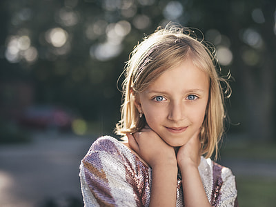 photo of girl with purple and white sequinned top thumbnail