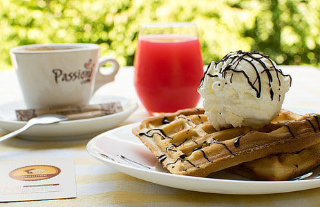 waffle with chocolate syrup and whipped cream toppings thumbnail