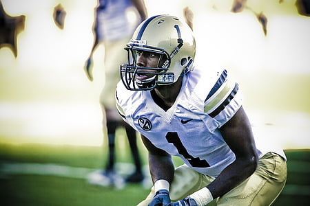 selective focus photograph of American football player thumbnail