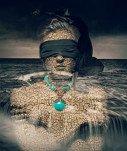 optical illusion of woman blinded with body of water thumbnail