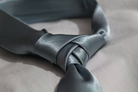 gray necktie on white textile thumbnail