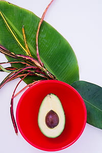 avocado on red bowl thumbnail