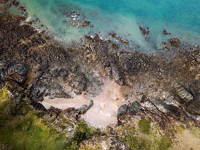 aerial photo of body of water during daytime thumbnail