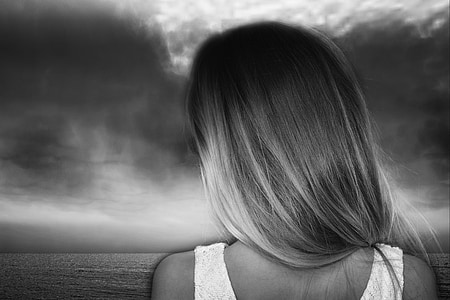 grayscale photo of woman thumbnail