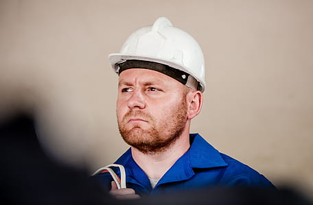 man wears white hard hat thumbnail