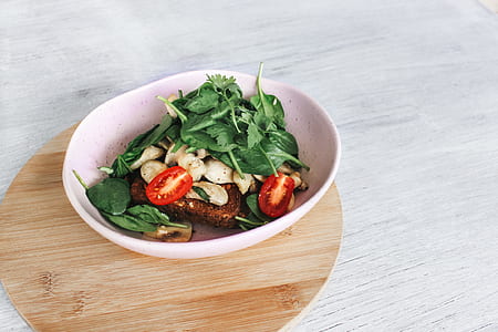 white ceramic bowl with sliced vegetables thumbnail
