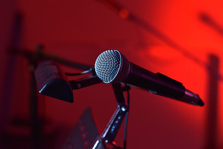 black corded microphone on stand thumbnail