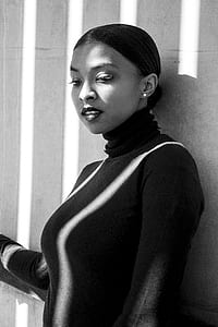 woman wearing turtleneck long-sleeved shirt thumbnail
