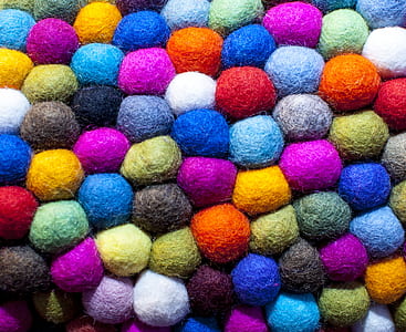 pile of assorted-colored ball cushions thumbnail