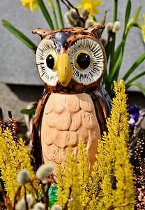 brown and white owl figurine thumbnail