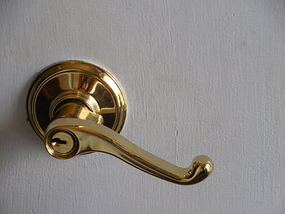 gold-colored door lever thumbnail