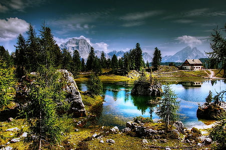 house near the body of water graphic wallpaper thumbnail