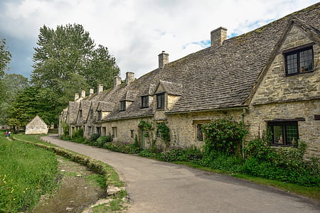 photography of brown house during daytime thumbnail