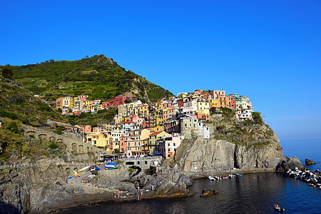 houses near coast at daytime thumbnail