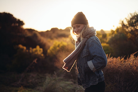 woman wearing blue denim button-up jacket and gray scarf thumbnail