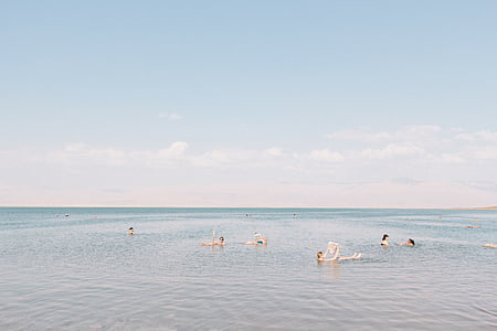 group of person on body of water thumbnail