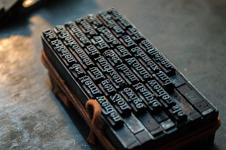 macro photography of black text stamp thumbnail