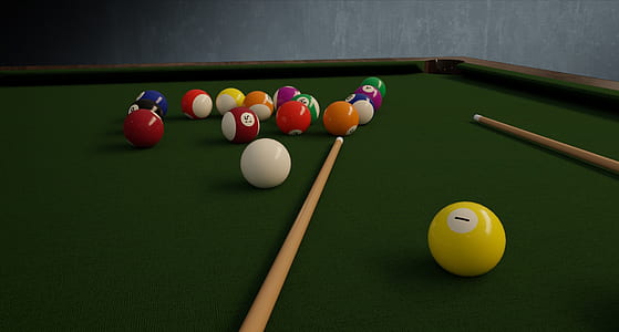 billiard balls and cue sticks on green pool table thumbnail