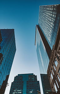 worm's-eye view photography of city buildings thumbnail